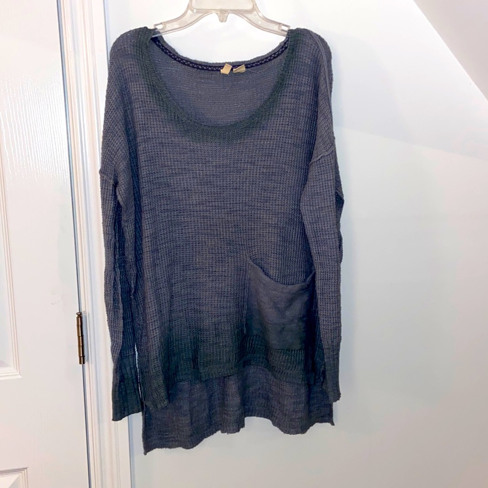 Scoop neck knot sweater with traces of blue and green blended in. Size S